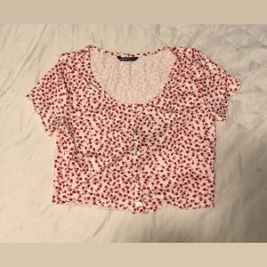 A red flowered crop top, very soft material and the make is from SHEIN